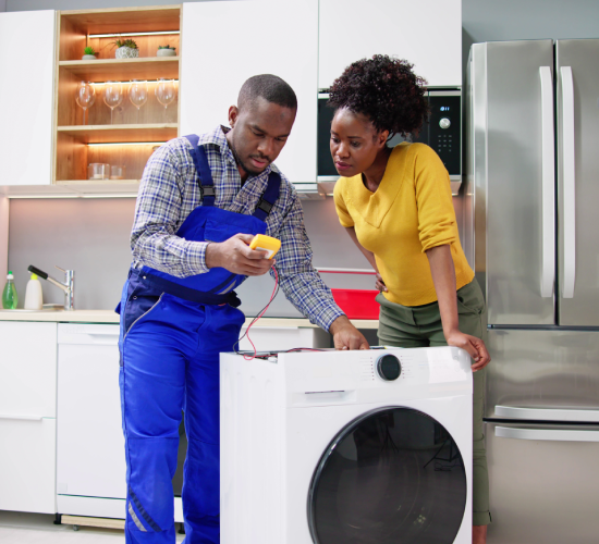 technician-repairing-washing-machine